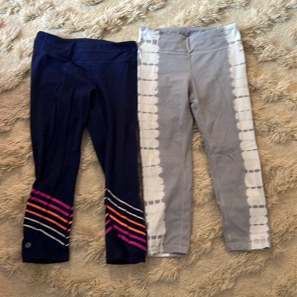 Pants & Jumpsuits Two Pairs Of Athleta Girl Capri Leggings Poshmark